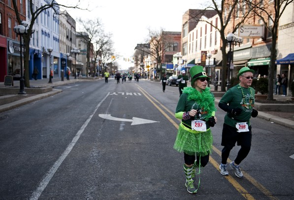Participants walk in Shamrocks and Shenanigans on Main Street on Sunday, March 10. The 5K is sponsored by Conor O'Neill's Irish Pub and benefits Mott Children's Hospital Save A Heart program. There were more than 2,600 participants. Daniel Brenner I AnnArbor.com